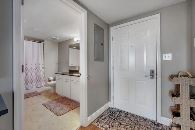 300 S Duval St # 1408, Tallahassee, FL 32301 - entrance foyer with electric panel and baseboards