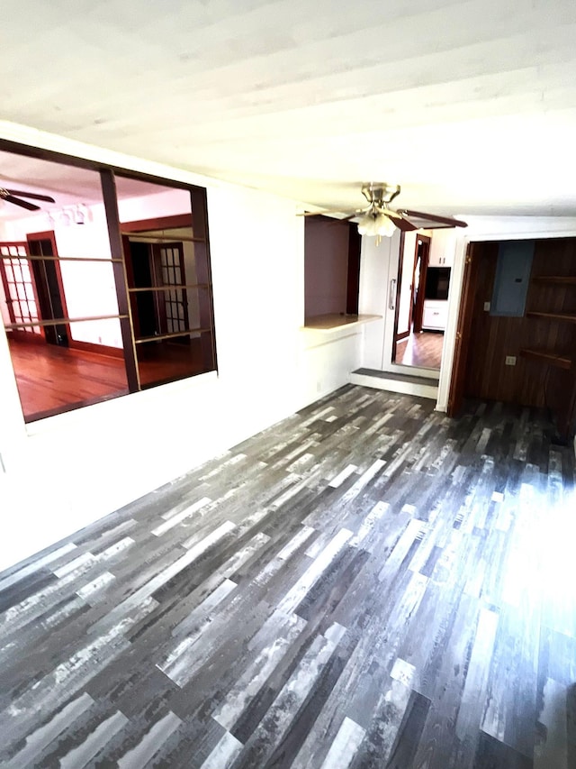 16619 SW Gaskin St, Blountstown, FL 32424 - unfurnished living room featuring a ceiling fan, wood finished floors, and electric panel