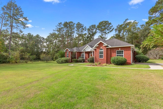 ranch-style house featuring a front lawn