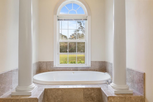 bathroom with tiled tub