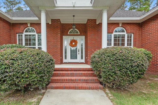 property entrance with covered porch