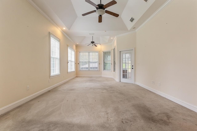 carpeted spare room featuring ceiling fan, high vaulted ceiling, and ornamental molding