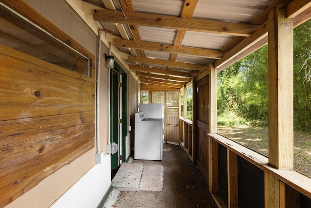 2056 N Sam Poppell Rd, Perry, FL 32347 - unfurnished sunroom featuring washer / dryer