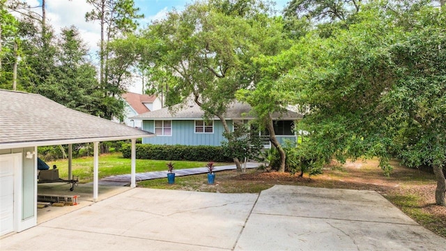 exterior space with a front lawn