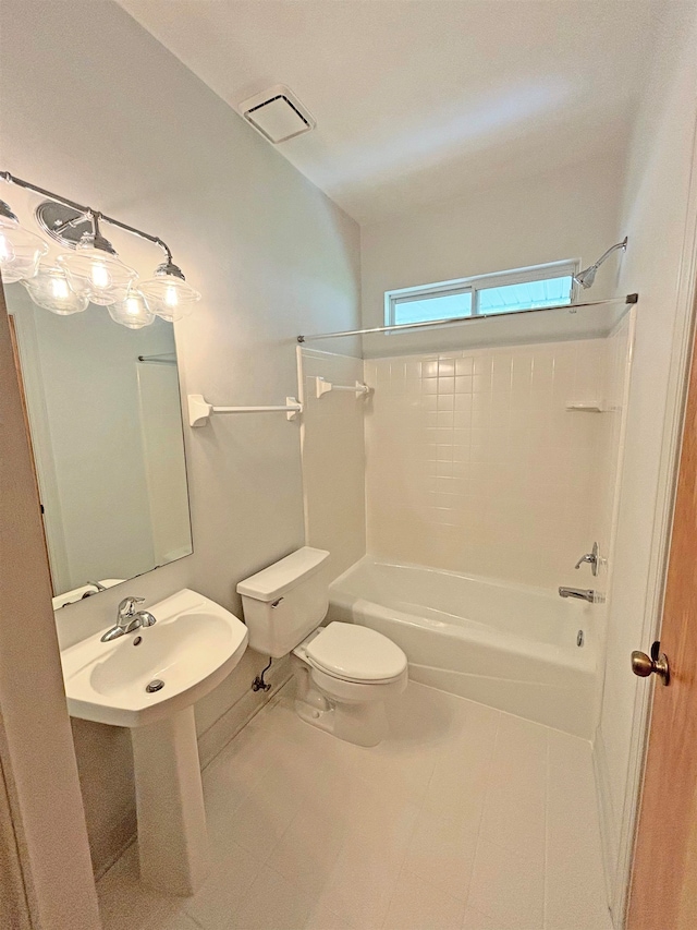 full bathroom featuring toilet, sink, and bathing tub / shower combination