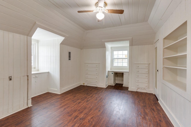 bonus room featuring ceiling fan, dark wood-type flooring, built in features, lofted ceiling, and wood ceiling