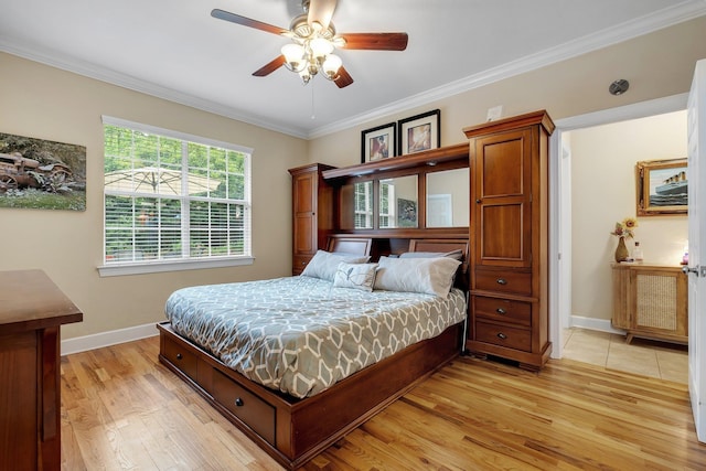 2031 Windsor Oaks Ct, Tallahassee, FL 32308 - bedroom featuring ornamental molding, baseboards, light wood-style floors, and a ceiling fan