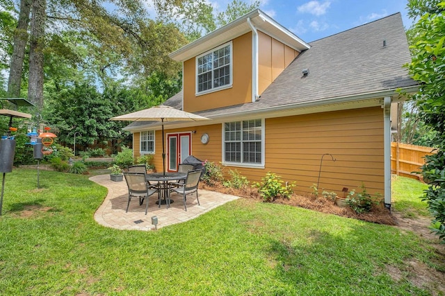 2031 Windsor Oaks Ct, Tallahassee, FL 32308 - rear view of house featuring a patio and roof with shingles