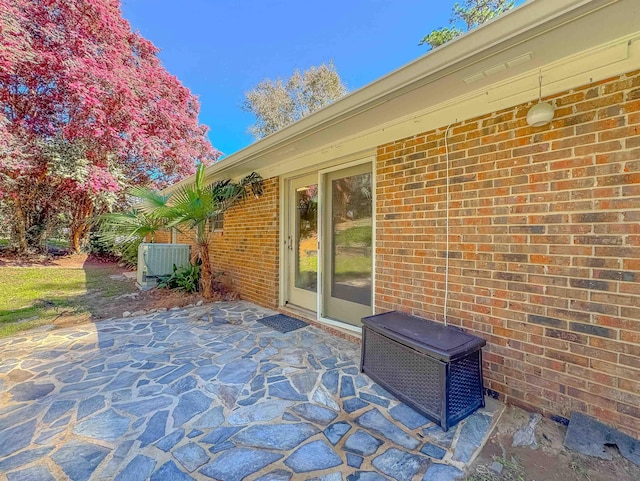 view of patio with central AC