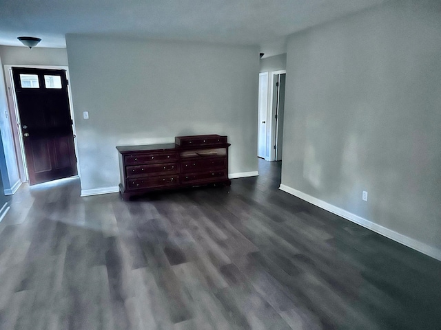 interior space with dark hardwood / wood-style floors