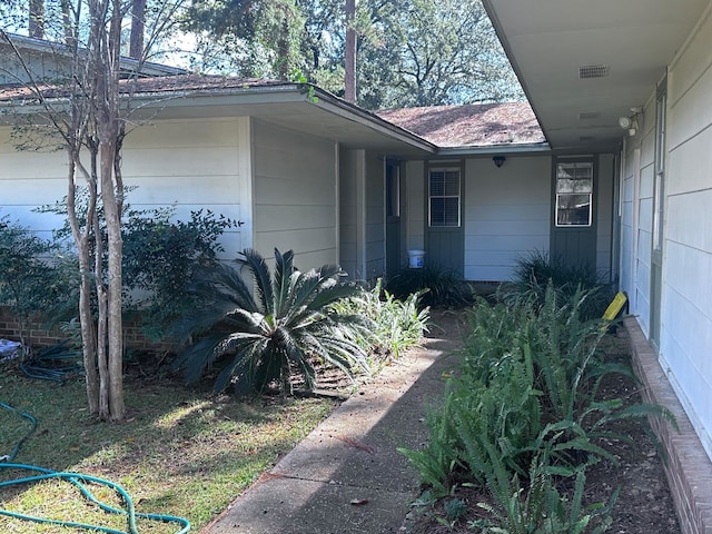 view of side of home with a garage