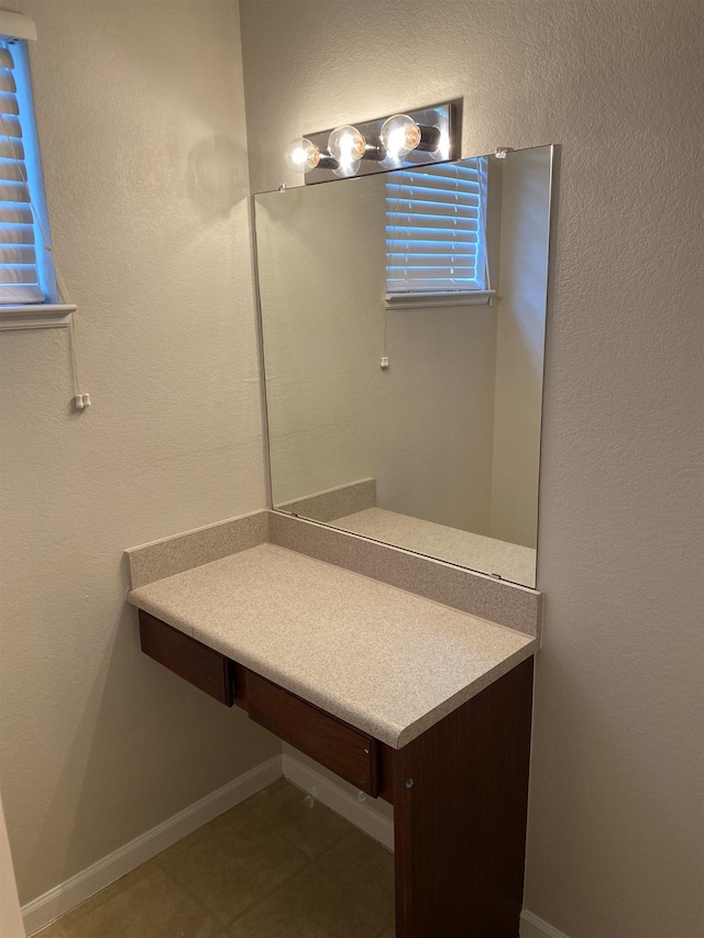 2801 Chancellorsville Dr Unit 1412, Tallahassee, FL 32312 - bathroom with tile patterned floors, vanity, and baseboards