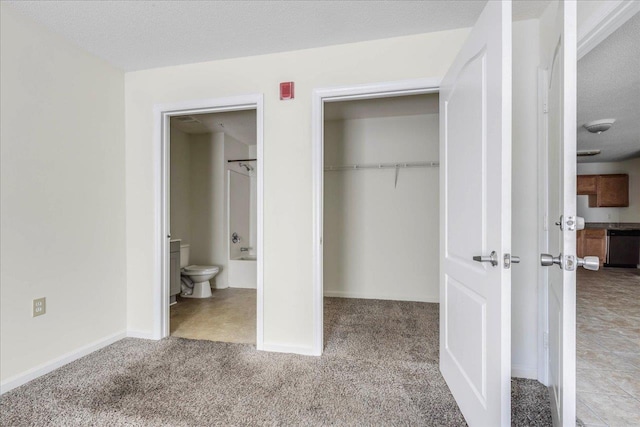 3000 S Adams St Unit 113, Tallahassee, FL 32301 - unfurnished bedroom featuring a closet, carpet floors, and baseboards