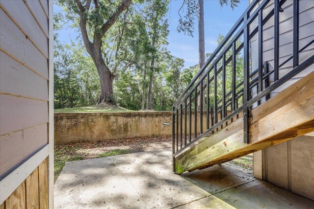 3000 S Adams St Unit 113, Tallahassee, FL 32301 - view of yard with stairs and a patio