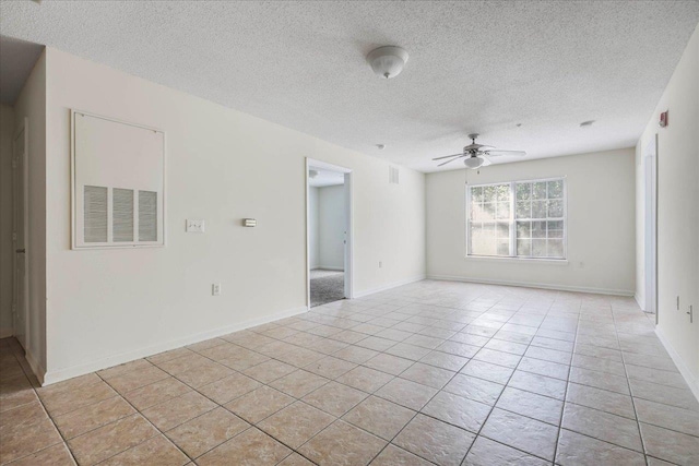 3000 S Adams St Unit 113, Tallahassee, FL 32301 - empty room with ceiling fan, a textured ceiling, and light tile patterned floors