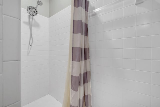 bathroom with curtained shower