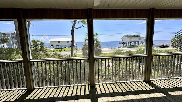 wooden terrace with a water view