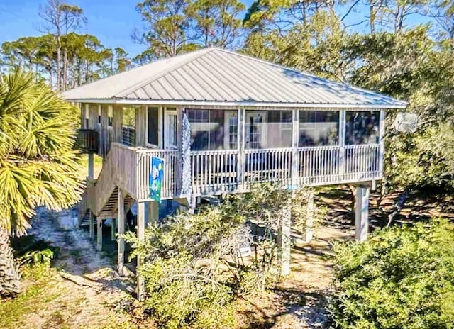 view of front of property with a sunroom