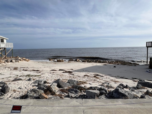 view of water feature featuring a beach view