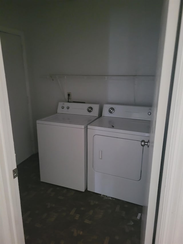 washroom featuring washer and dryer