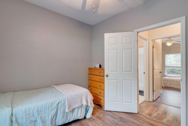 3524 Rosemont Ridge Rd, Tallahassee, FL 32312 - bedroom featuring wood finished floors, vaulted ceiling, and a ceiling fan