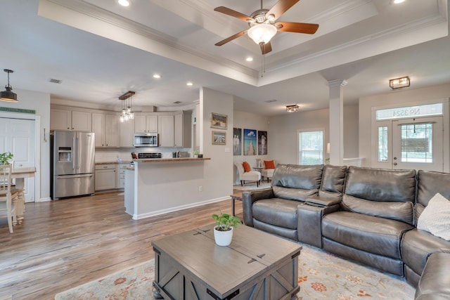 3524 Rosemont Ridge Rd, Tallahassee, FL 32312 - living room with a tray ceiling, crown molding, light wood-type flooring, recessed lighting, and ceiling fan