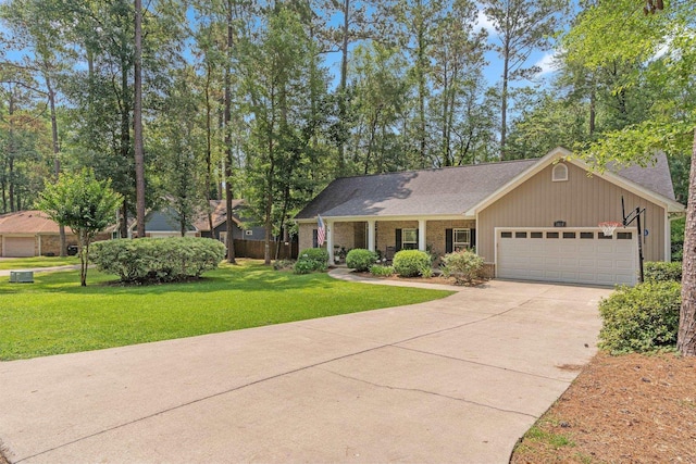 3524 Rosemont Ridge Rd, Tallahassee, FL 32312 - view of front facade with a garage, concrete driveway, a front lawn, and brick siding