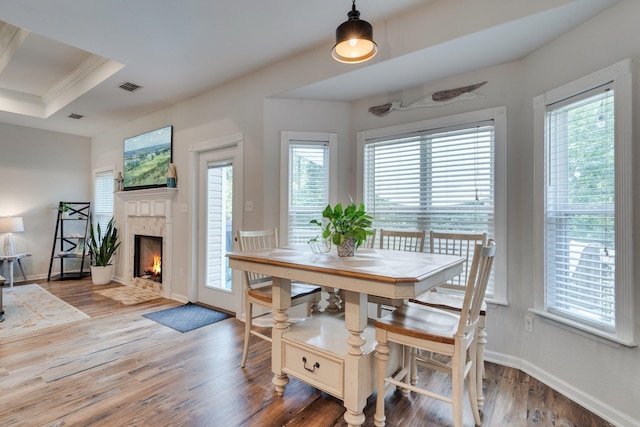 3524 Rosemont Ridge Rd, Tallahassee, FL 32312 - dining room featuring wood finished floors and a brick fireplace