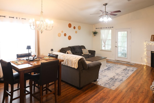 330 Dreadnaught Ct, Tallahassee, FL 32312 - dining room with ceiling fan, dark wood-style floors, a chandelier, vaulted ceiling, and baseboards