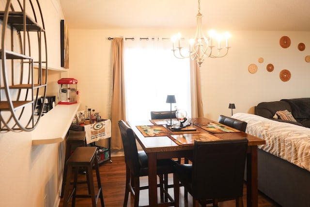 330 Dreadnaught Ct, Tallahassee, FL 32312 - dining space with a chandelier and dark wood-style flooring