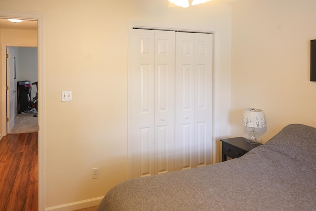 330 Dreadnaught Ct, Tallahassee, FL 32312 - bedroom with baseboards, a closet, and dark wood finished floors