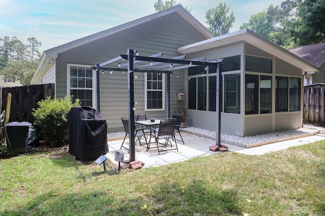 330 Dreadnaught Ct, Tallahassee, FL 32312 - rear view of property featuring a pergola, a sunroom, and a patio area
