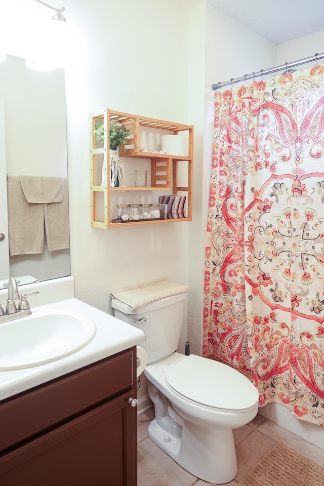 330 Dreadnaught Ct, Tallahassee, FL 32312 - bathroom featuring vanity, toilet, tile patterned floors, and curtained shower