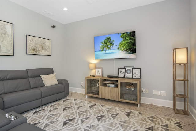 1324 Branch St, Tallahassee, FL 32303 - living room featuring light tile patterned flooring and recessed lighting