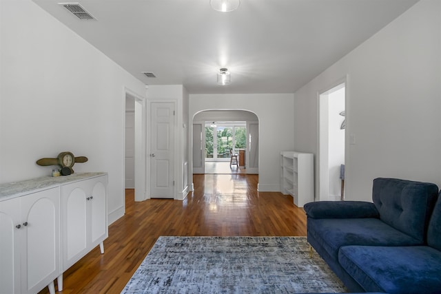 1324 Branch St, Tallahassee, FL 32303 - corridor with arched walkways and wood finished floors