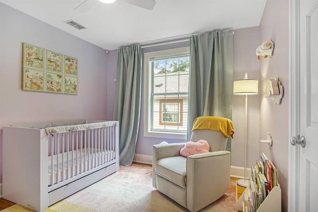 1324 Branch St, Tallahassee, FL 32303 - bedroom featuring a nursery area and a ceiling fan
