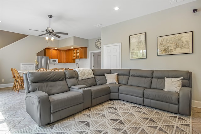 1324 Branch St, Tallahassee, FL 32303 - living room featuring ceiling fan, lofted ceiling, light tile patterned flooring, and recessed lighting
