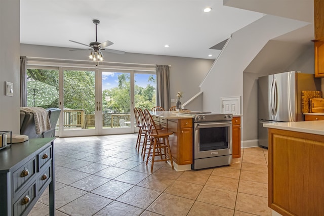 1324 Branch St, Tallahassee, FL 32303 - kitchen featuring stainless steel appliances, a breakfast bar area, plenty of natural light, ceiling fan, and recessed lighting