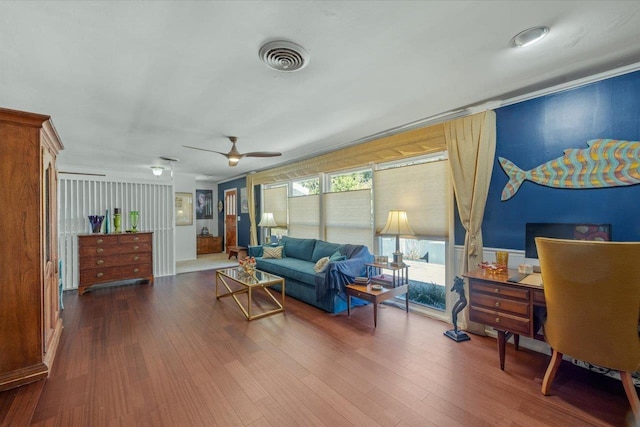 living room with hardwood / wood-style flooring and ceiling fan