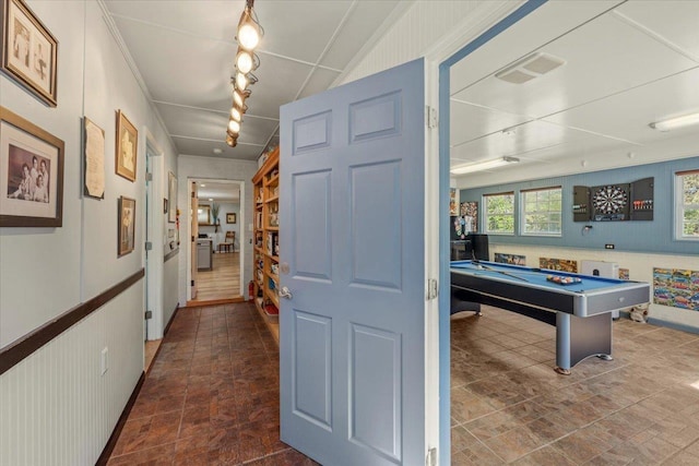 hall featuring ornamental molding