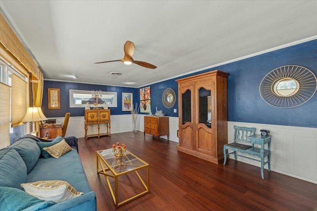 living room featuring a wealth of natural light, ceiling fan, dark hardwood / wood-style floors, and ornamental molding