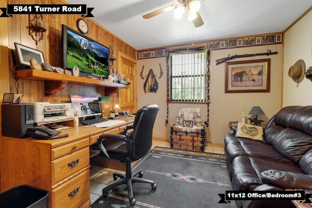 5481 Turner Rd, Perry, FL 32348 - home office featuring ceiling fan, wooden walls, and tile patterned floors