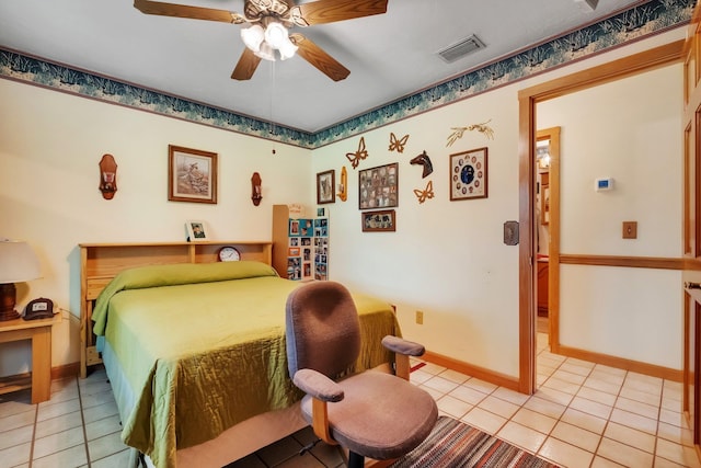5481 Turner Rd, Perry, FL 32348 - bedroom with light tile patterned floors, baseboards, and ceiling fan