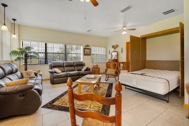 5481 Turner Rd, Perry, FL 32348 - bedroom with light tile patterned flooring and a ceiling fan