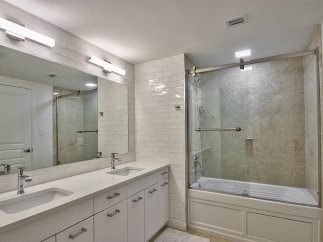 300 S Duval St Unit 2006, Tallahassee, FL 32301 - full bath with enclosed tub / shower combo and double vanity