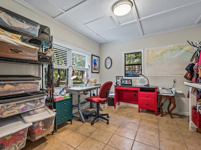 tiled office with a healthy amount of sunlight