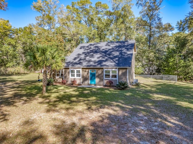 view of outbuilding featuring a lawn