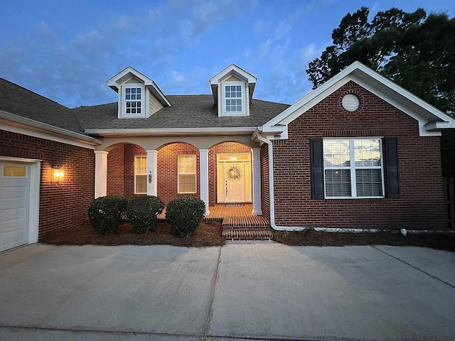2541 Lagrange Trl, Tallahassee, FL 32312 - view of front facade featuring brick siding and roof with shingles