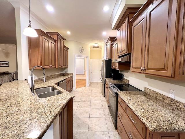 2541 Lagrange Trl, Tallahassee, FL 32312 - kitchen featuring stainless steel appliances, light stone countertops, pendant lighting, under cabinet range hood, and light tile patterned floors