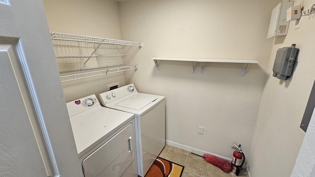 2801 Chancellorsville Dr Unit 1316, Tallahassee, FL 32312 - washroom featuring washer and clothes dryer and baseboards